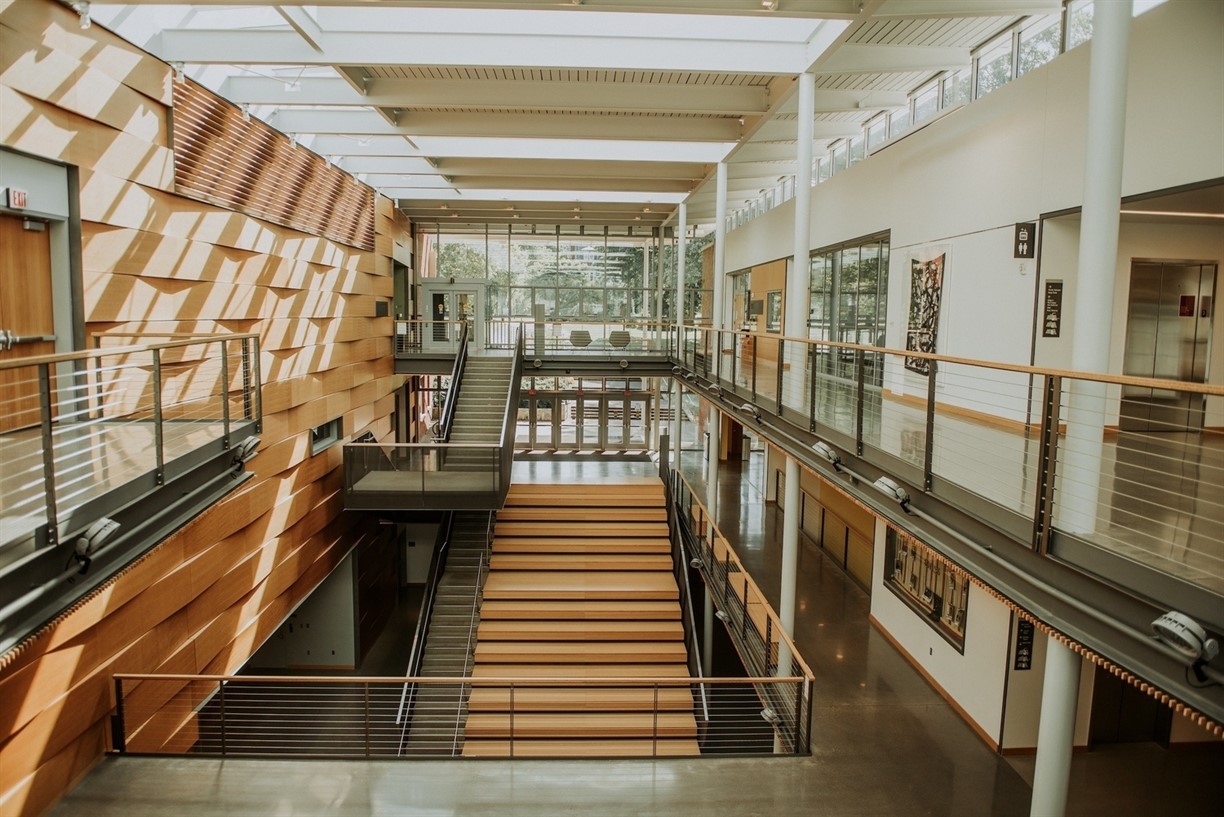 Image shows a panoramic view of the interior atrium of the Performing Arts Building